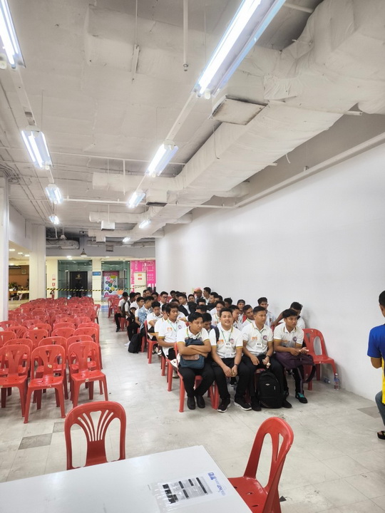 Workers seated at training